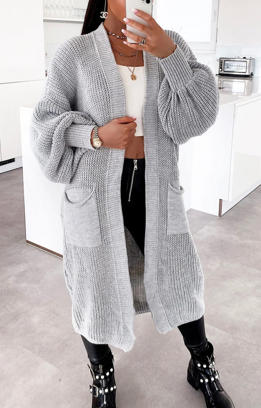 ASSIYA VEST MET POFMOUWEN LICHTGRIJS