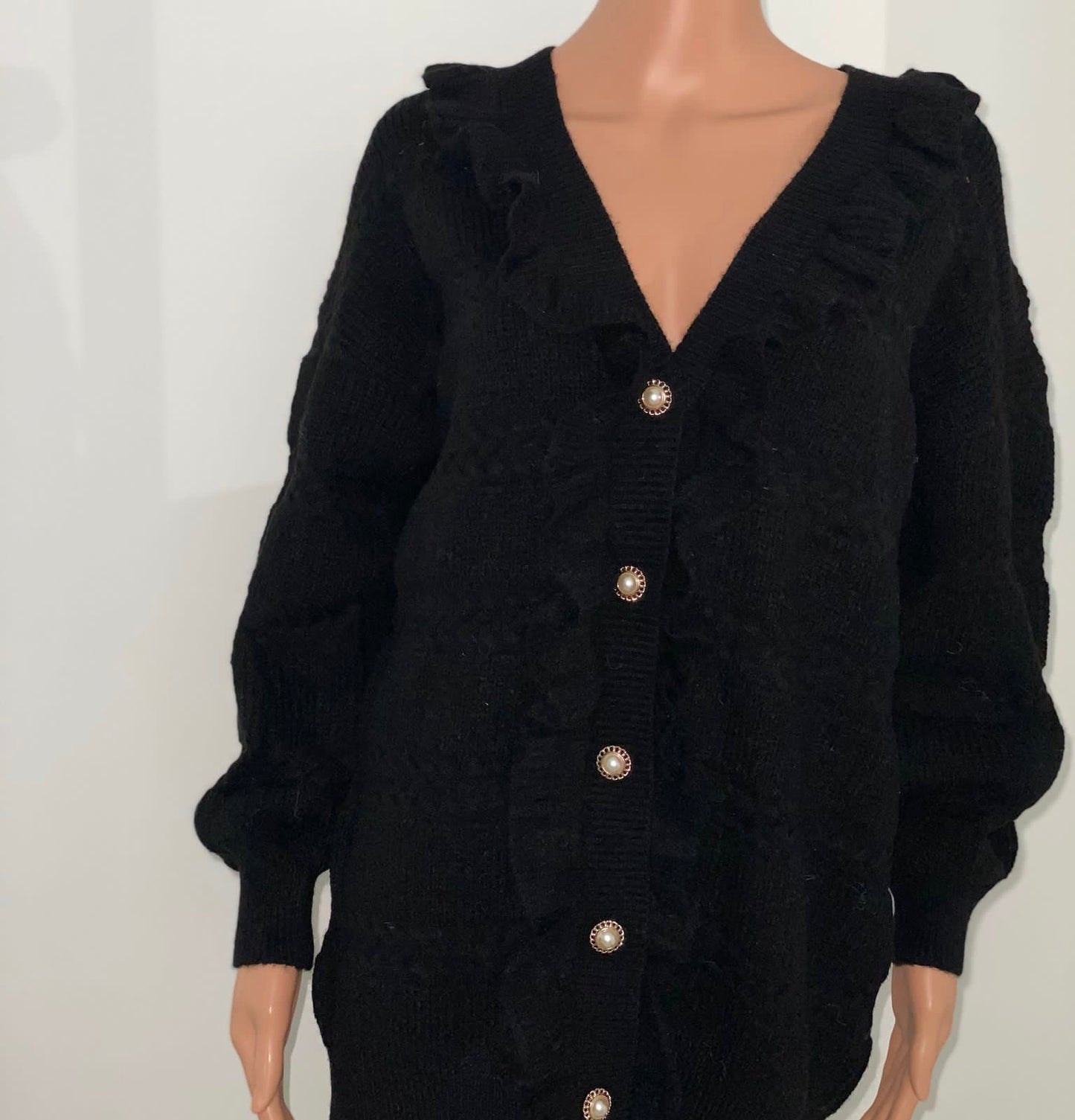 SENNA VEST MET RUFFLES ZWART